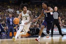 SHOCKING HALFTIME DRAMA: Michigan's Jaw-Dropping 3